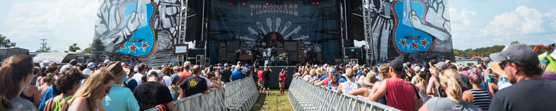 A large crowd watching the stage at the Pilgrammage music festival