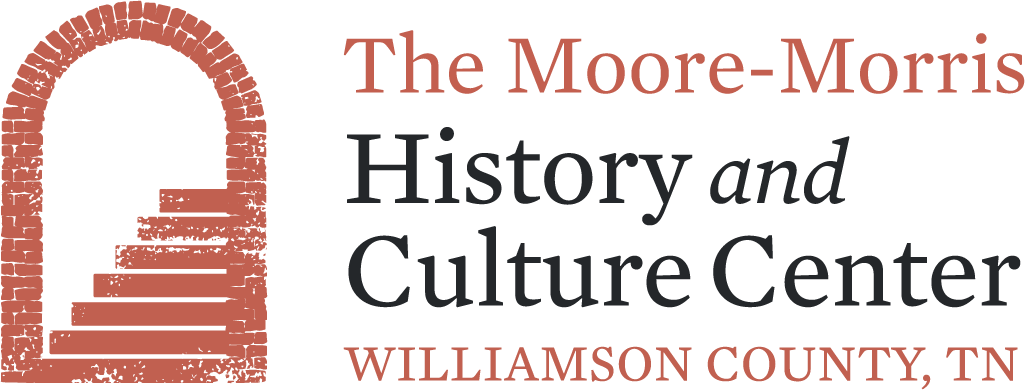 The Moore-Morris History and Culture Center in Williamson County, TN, features an orange archway logo with steps leading up to it in Williamson County, Tennessee.